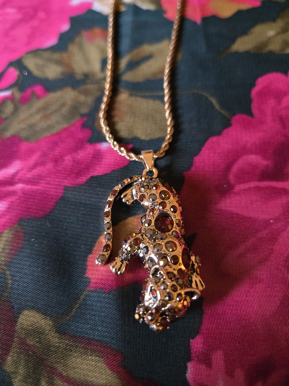 Gold-Tone Leopard Pendant Necklace with Red Crystal Accents